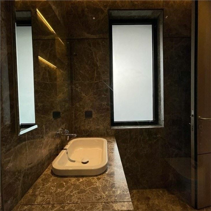 dark emperador marble bathroom